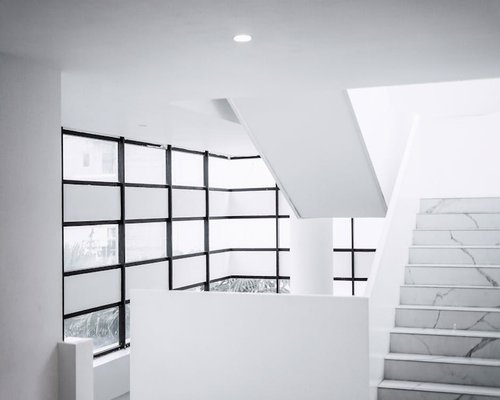 Modern office staircase well-lit by natural light